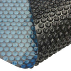 Pellicola Galleggiante Solare PE Piscina 1200x600 cm Nero e Blu